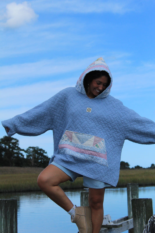 handmade vintage blue quilted hoodie with pink detailed pockets and hood
