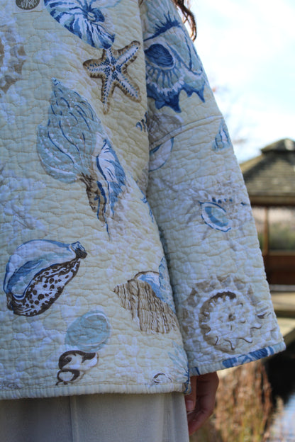 COZY SHELL COLLECTING MOCK NECK