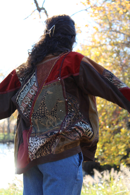 Brown patterned jacket with eye-catching animal motifs and a trendy fit.