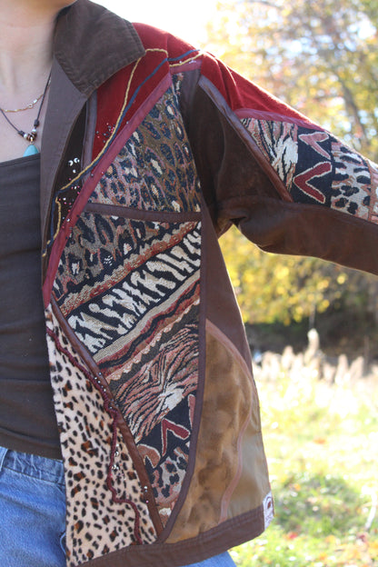 Statement brown jacket with wild animal designs and cool textured details.