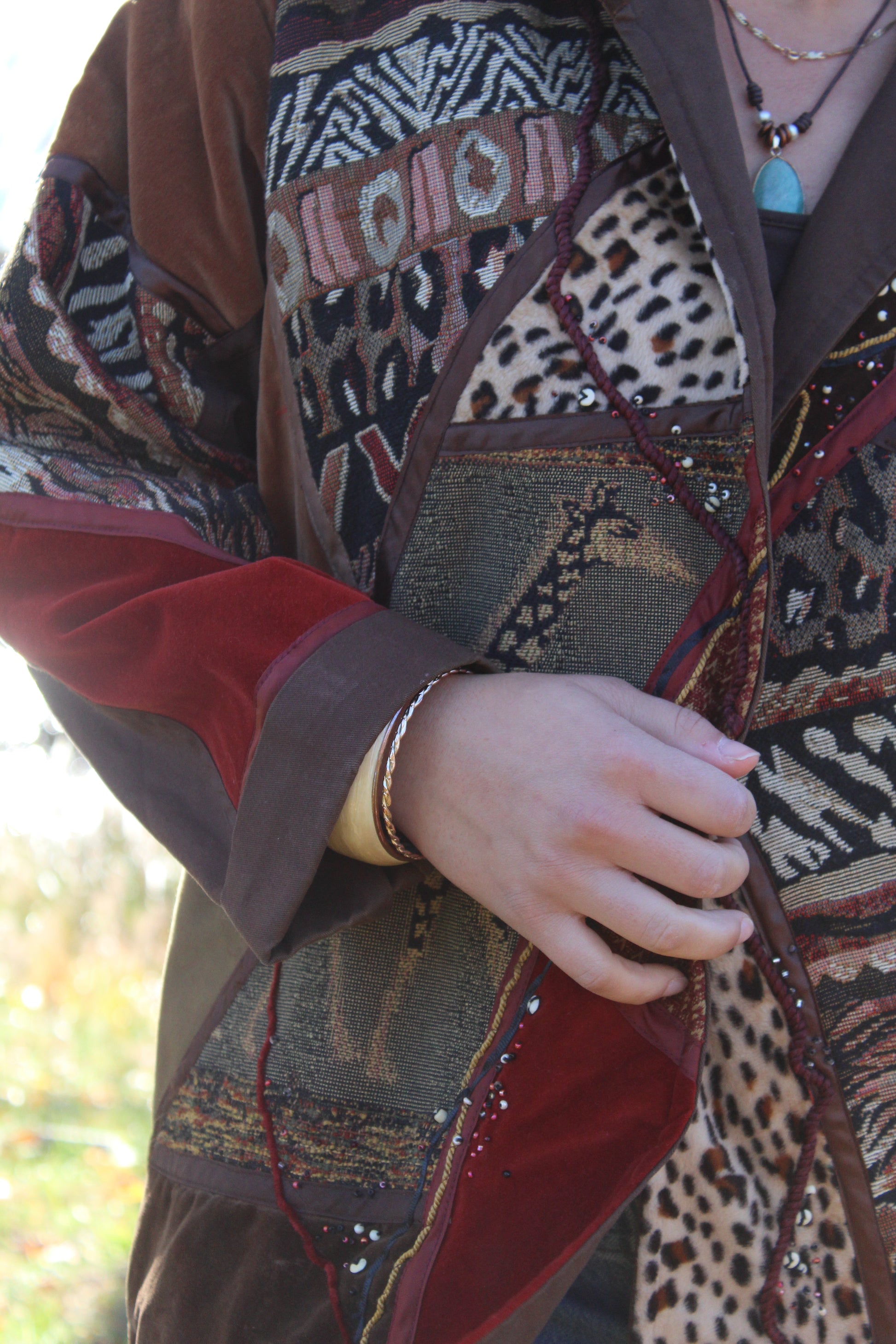 Brown jacket covered in bold animal patterns for a fun, standout look.