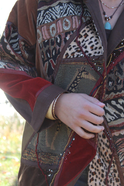 Brown jacket covered in bold animal patterns for a fun, standout look.