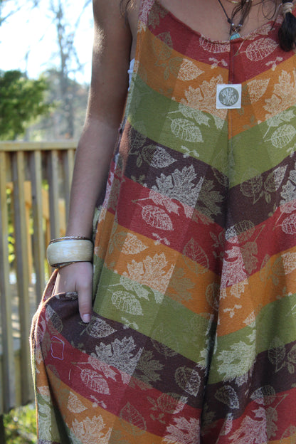 Vintage tablecloth turned into a handmade jumpsuit with earthy fall colors and charm