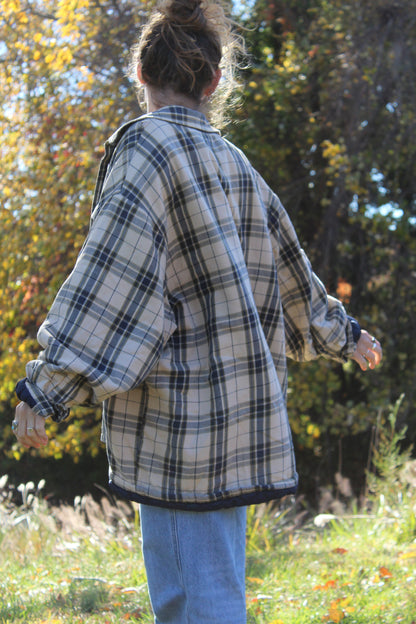 Oversized flannel featuring tan and navy checks and a slouchy fit.