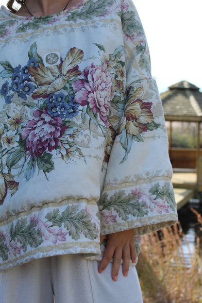 Charming upcycled crewneck featuring vintage comforter fabric with romantic floral design