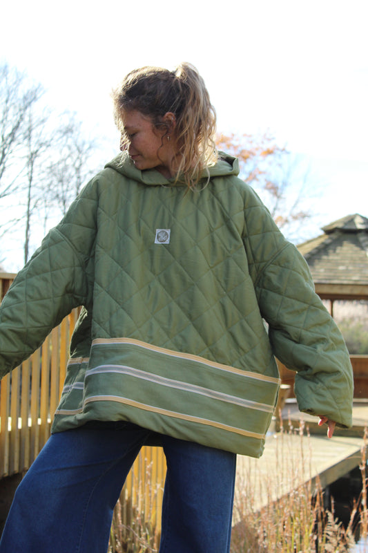 “Upcycled green hoodie with yellow stripe accent, crafted in a relaxed men’s fit.”