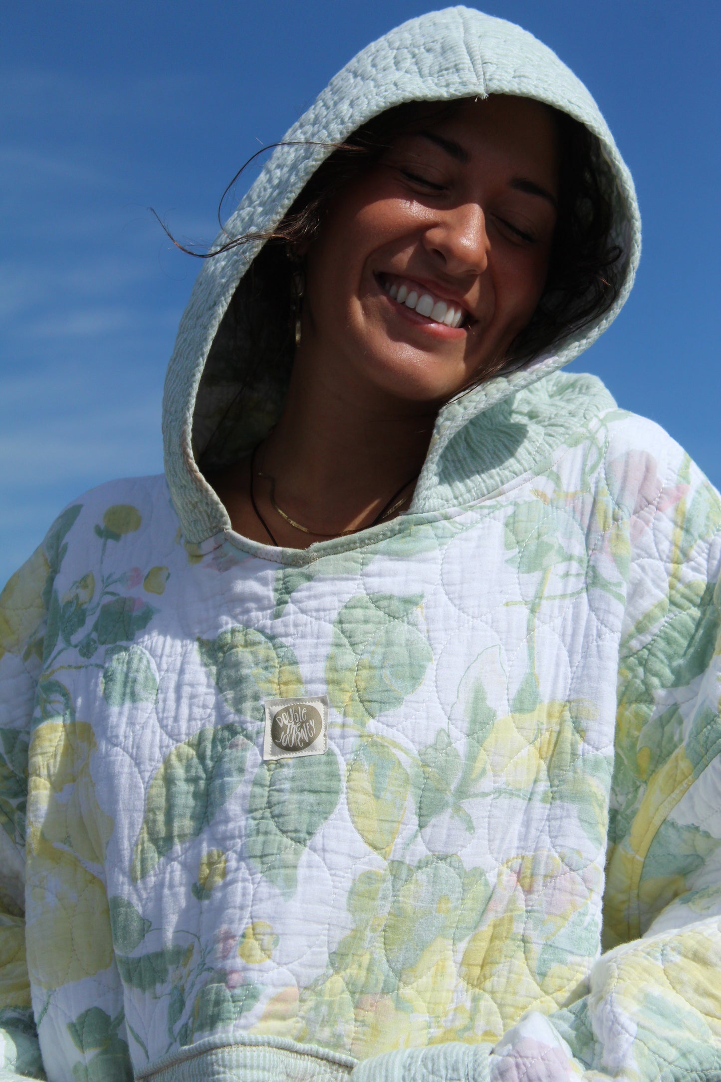 floral quilted hoodie with stitching details