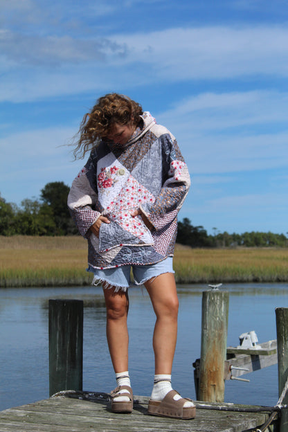 handmade vintage quilted hoodie cozy and warm for fall with a large pocket and scalloped hem