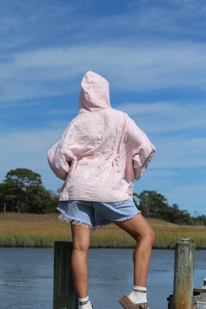 back view of  pink lightweight vintage quilted hoodie