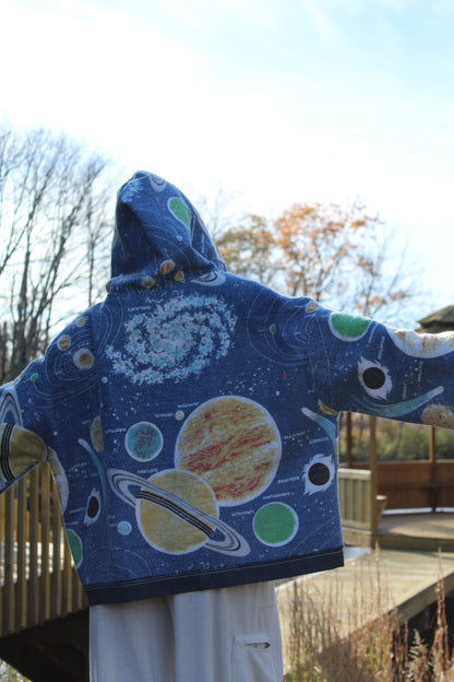 One-of-a-kind handmade hoodie showcasing galaxy-inspired blanket fabric