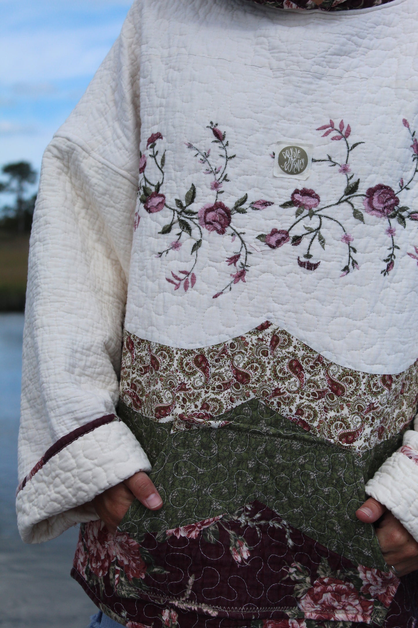 tan green and purple quilted hoodie with gorgeous floral detailing