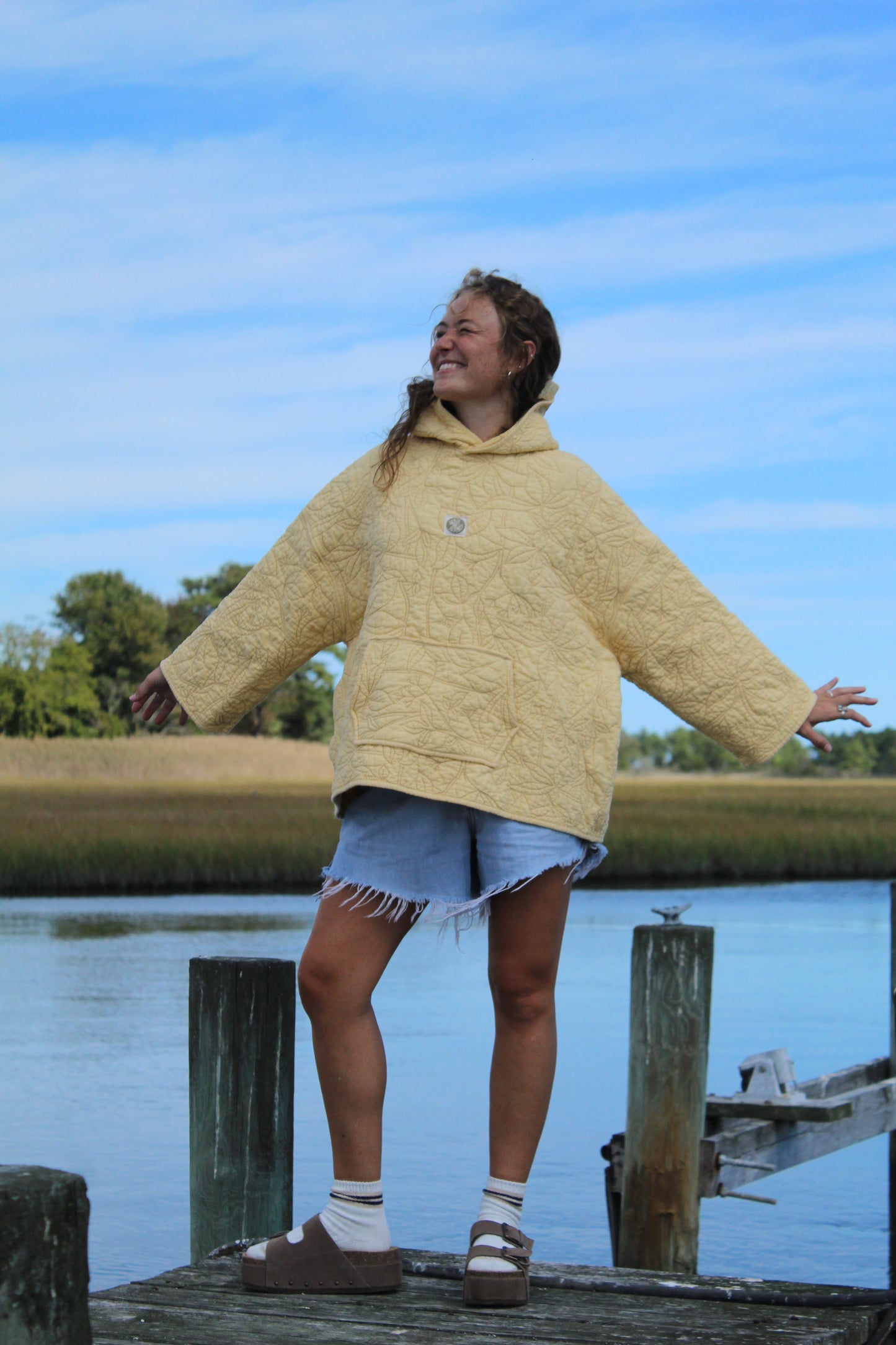light yellow vintage quilted hoodie with stitchwork floral details